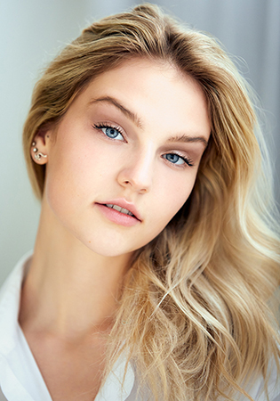 Headshot shot of young woman