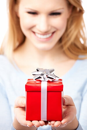 Woman holding a gift box